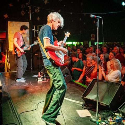 Guitarist in front of the crowd